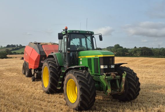 Tractor with baler